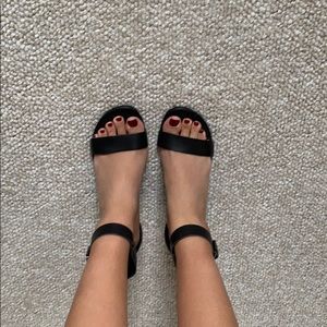 Black strapped low heeled wedge